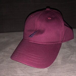 This is a burgundy nautica hat that was never worn before.